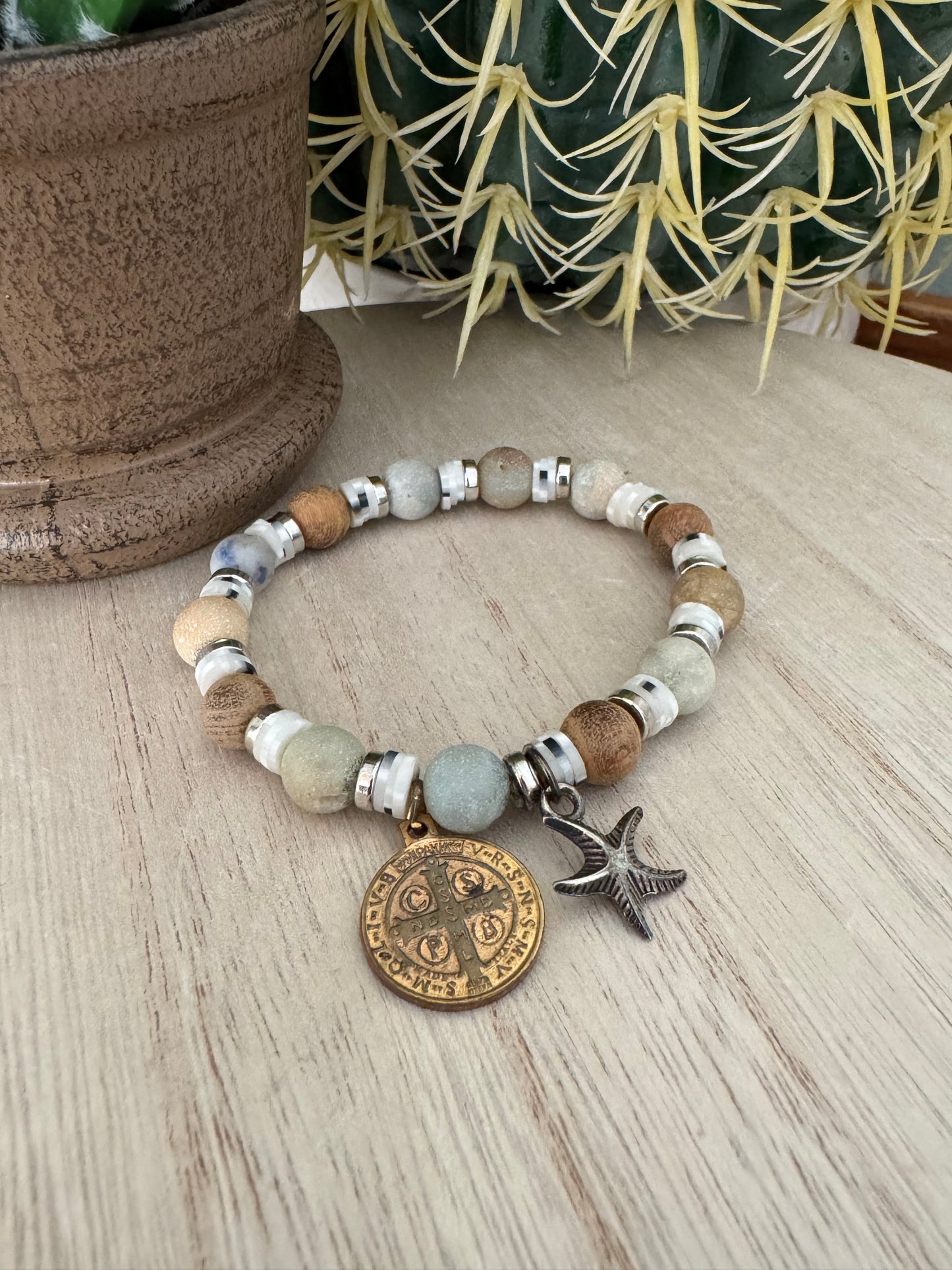Blue & Green Sea-Themed Stretch Bracelet with Starfish and St. Benedict Charms – 7 Inches