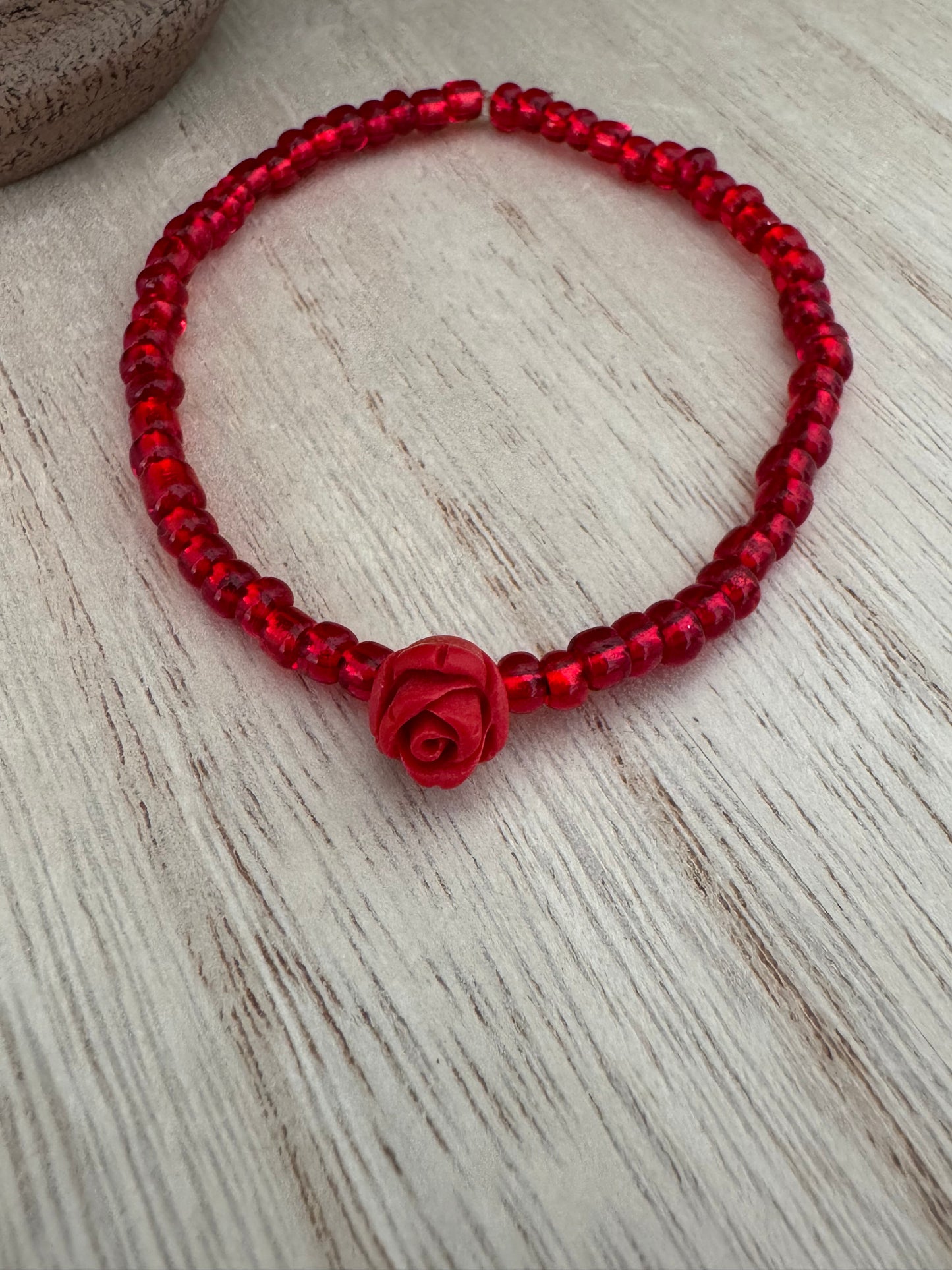 Handmade Red Beaded Stretch Bracelet with Rose Bead – 7 Inches