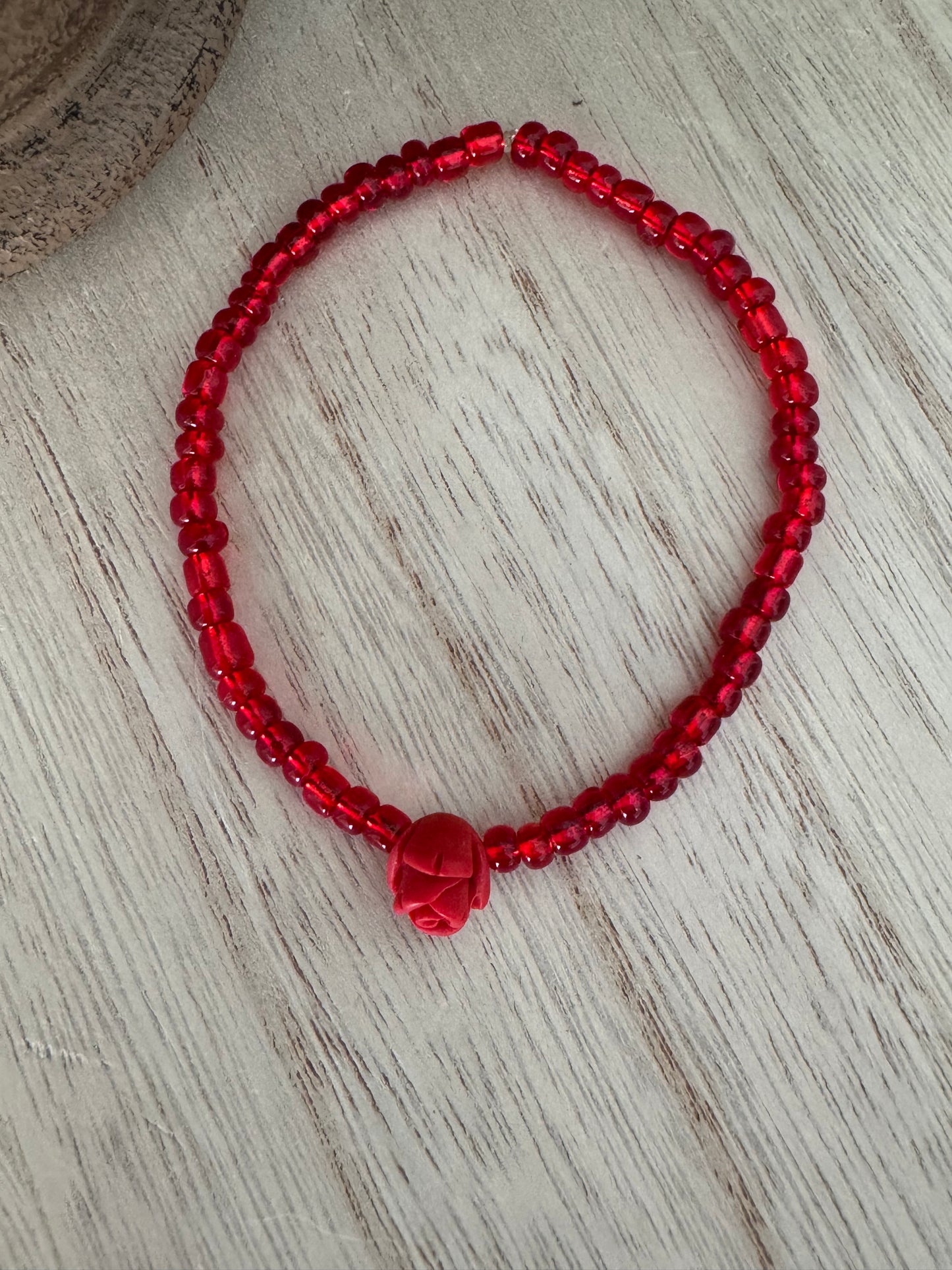 Handmade Red Beaded Stretch Bracelet with Rose Bead – 7 Inches