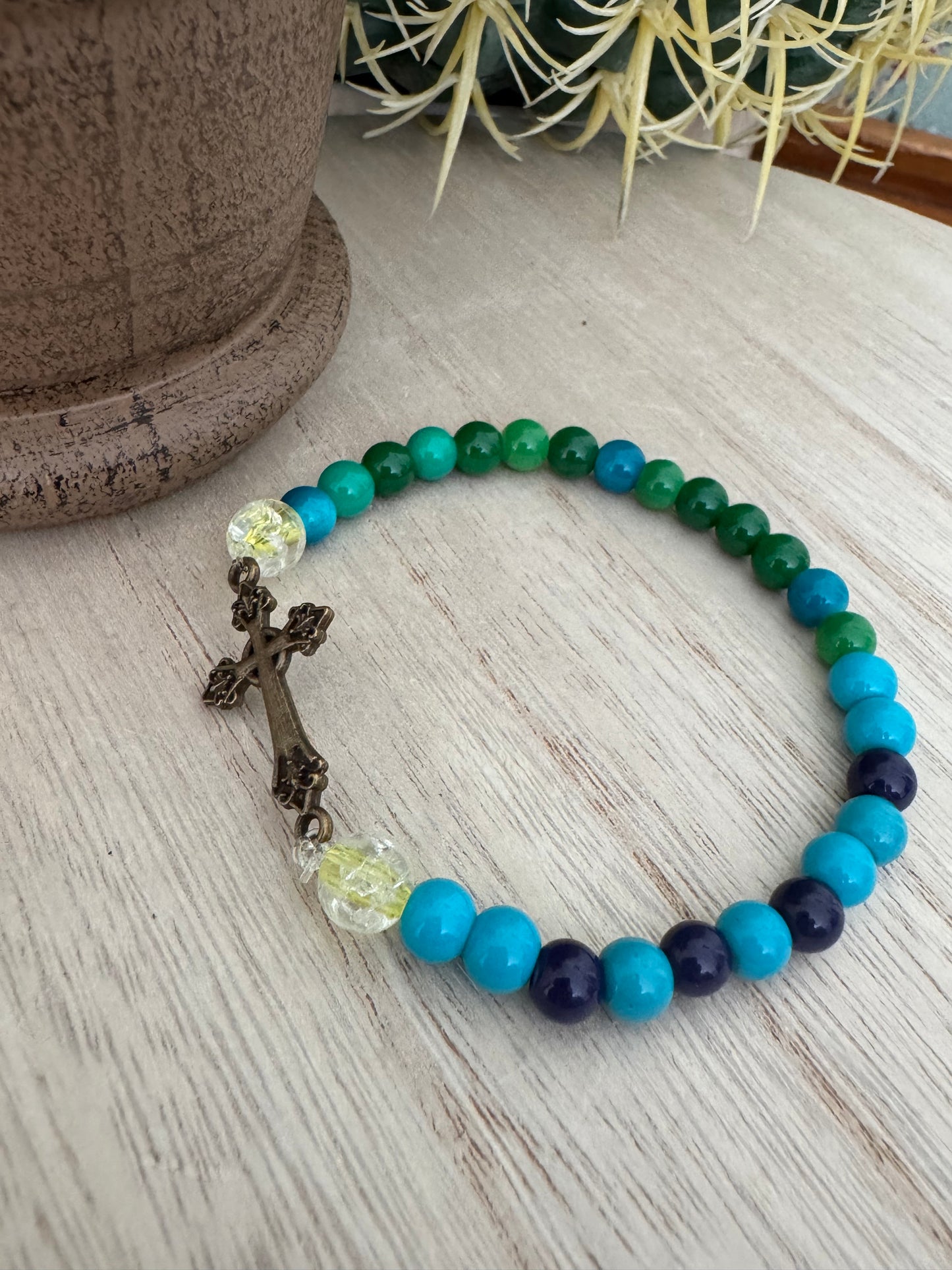 Green & Blue Stretch Bracelet with Bronze Cross