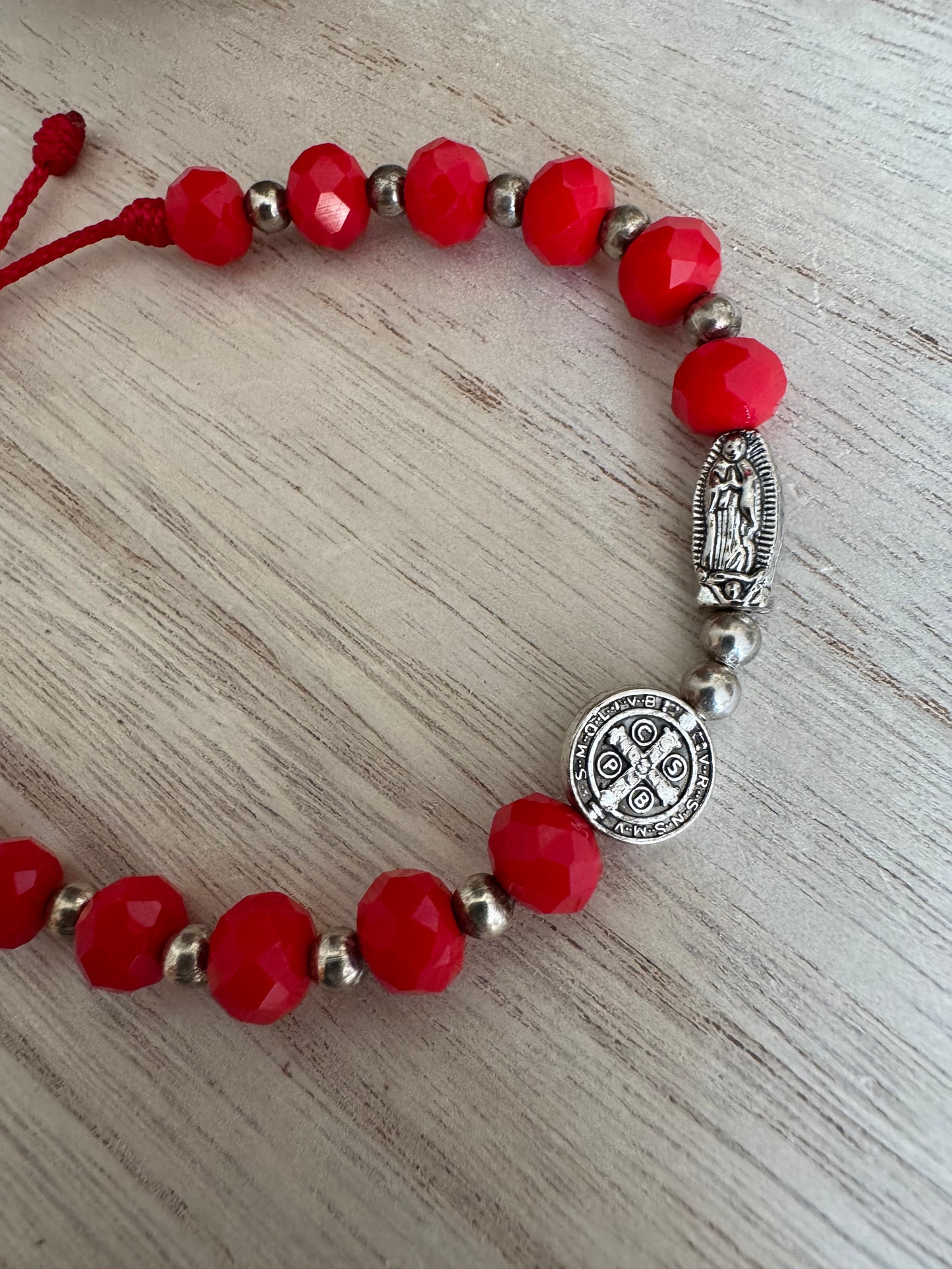 Red Adjustable Bracelet with Our Lady of Guadalupe Charm and St. Benedict Medal