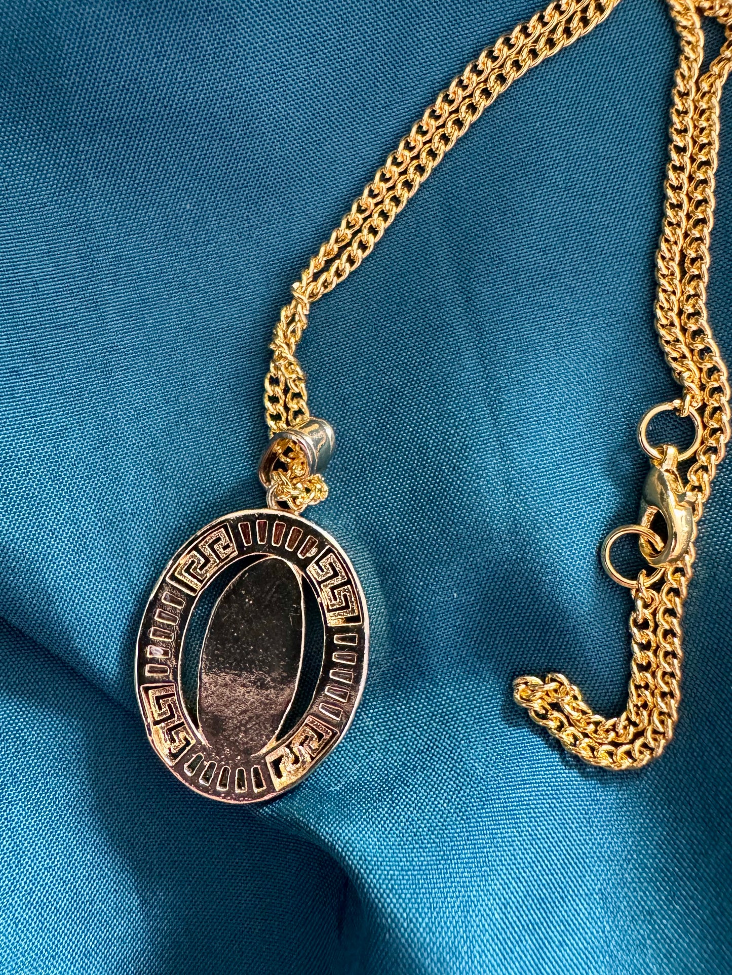 Our Lady of Guadalupe Necklace – Gold-Colored Metal with Red, White, and Green Accents