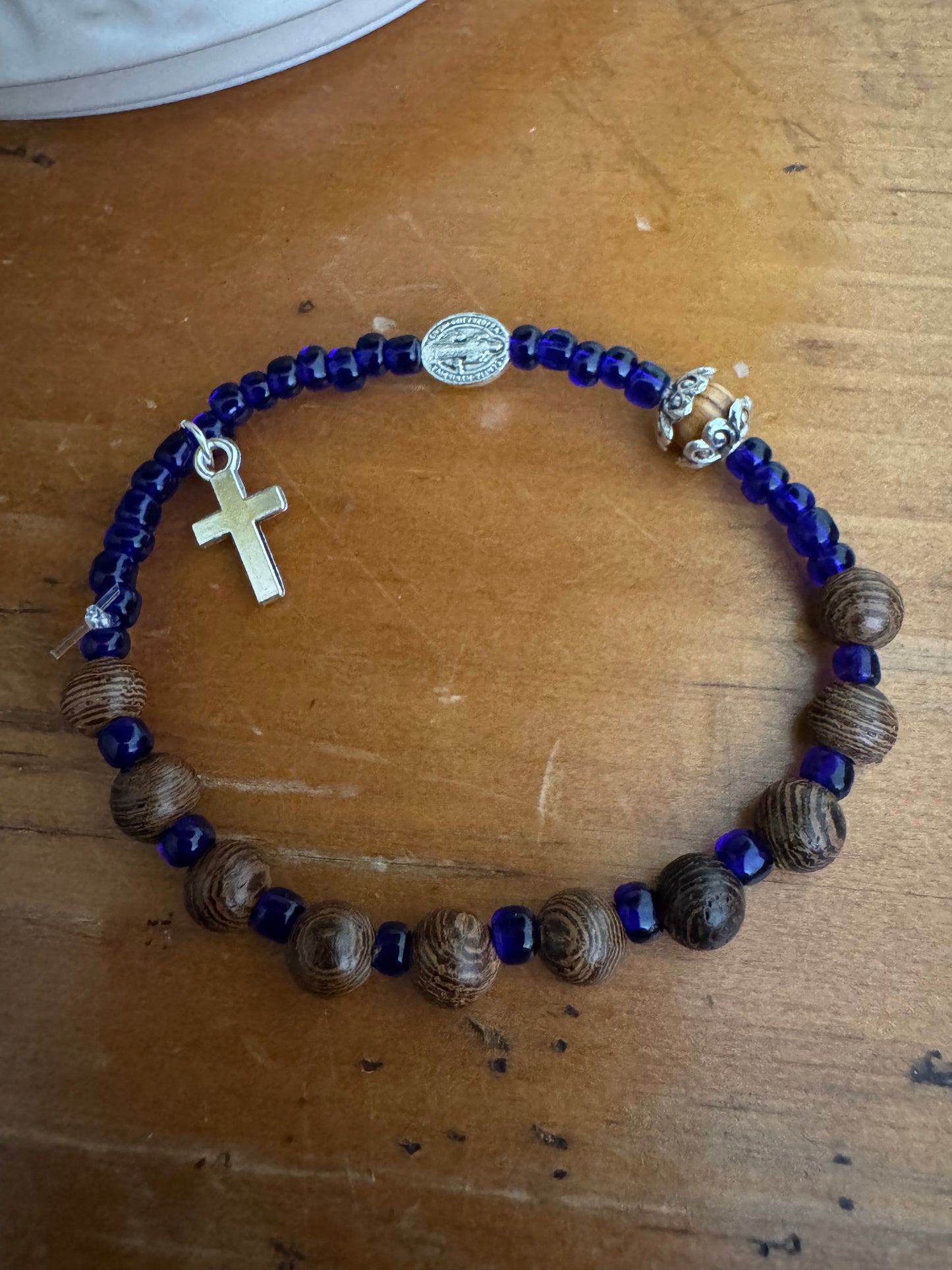 Handmade Dark Wood Rosary Bracelet with Royal Blue Spacers & Silver Cross