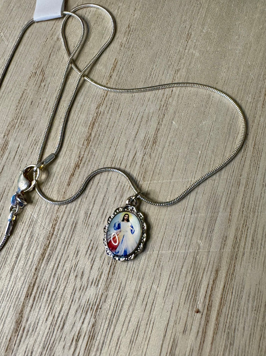 Necklace with a pendant on a wooden surface