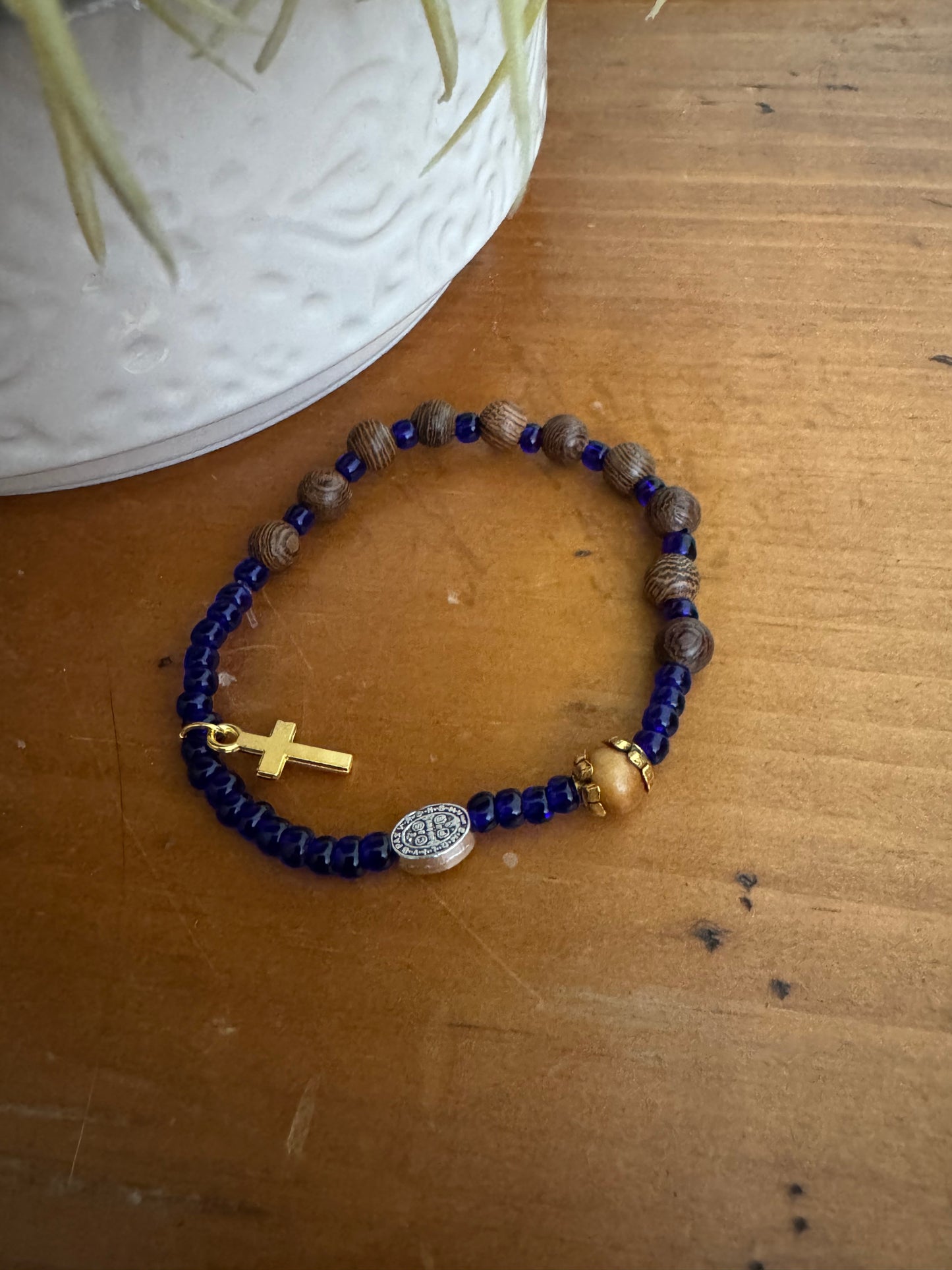 Handmade Dark Grained Wood Rosary Bracelet with Royal Blue Spacers & Gold Cross